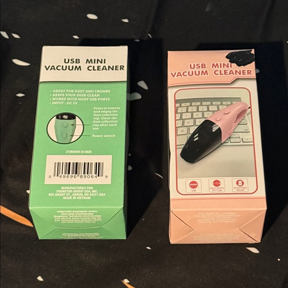 Choose one USB Mini Vacuum Cleaner in Pink and Green